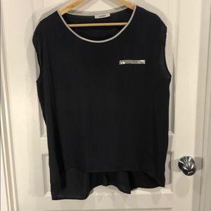 Grey, sleeveless blouse with silver accents